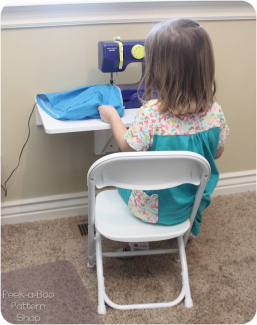 girl sewing