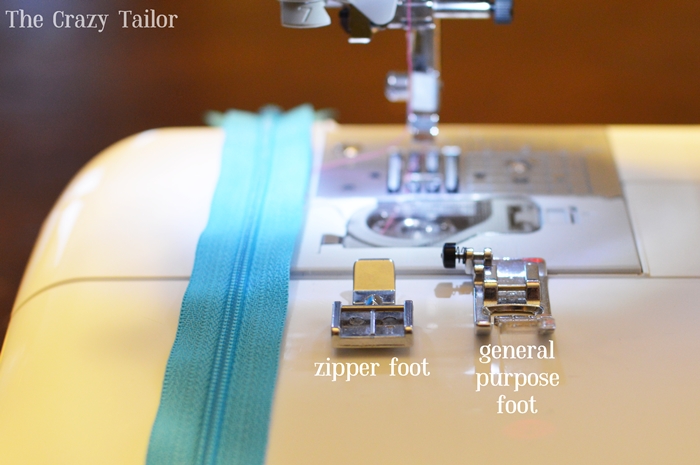 Zipper foot for sewing machine shown from above, displaying narrow single-sided design